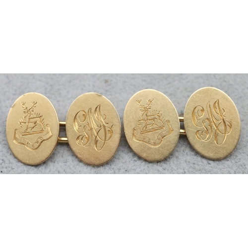 544 - A pair of 18ct gold gentlemen's oval cufflinks engraved with crest 