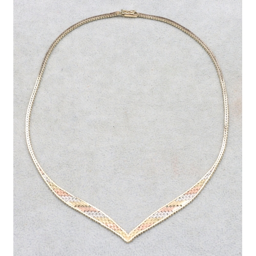 555 - A 9ct 3-coloured gold flat linked necklace, 40cm long, 15.6 grams