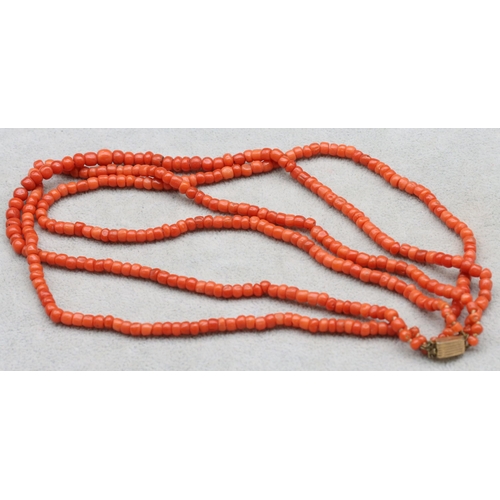 558 - An antique coral 3-row choker necklace with 9ct gold clasp, 41cm long