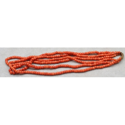 558 - An antique coral 3-row choker necklace with 9ct gold clasp, 41cm long