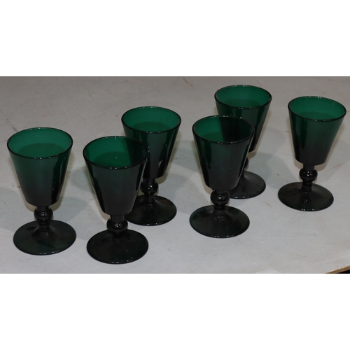 57 - A set of 6 18th/19th Century Bristol green glass round trumpet shaped glasses with knob stems on rou... 