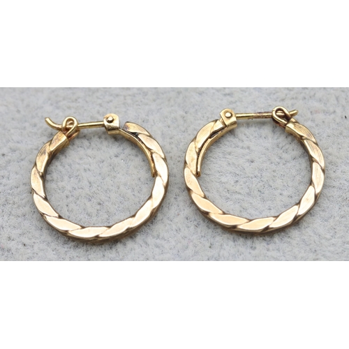 571 - A pair of 9ct gold hoop earrings, 1.7 grams