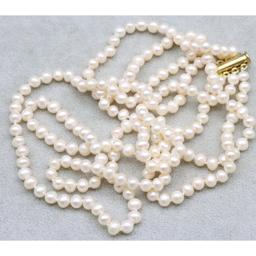 584 - A Freshwater pearl 3-row choker necklace