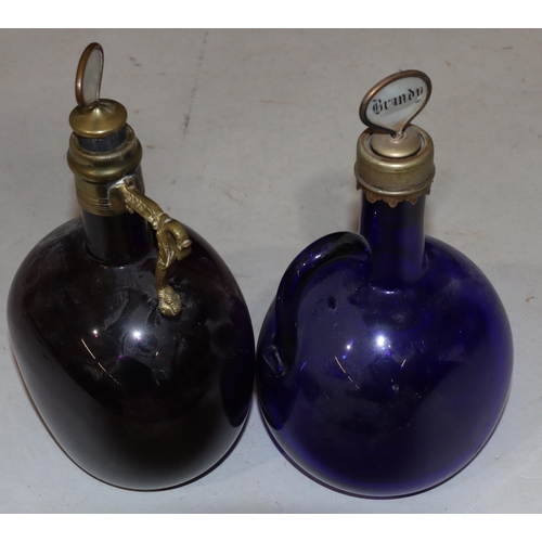 60 - A Georgian purple Bristol glass bulbous shaped decanter with metal neck and handle with stopper 