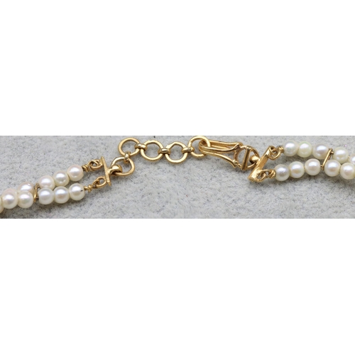 601 - An Indian 22ct gold and pearl double row necklace mounted with 5 small diamonds, 38cm long, 17.1 gra... 