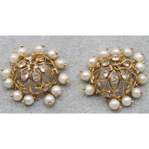 602 - A pair of Indian 22ct gold circular Jhumkha ear drops mounted with pearl and clear stones, 11.4 gram... 