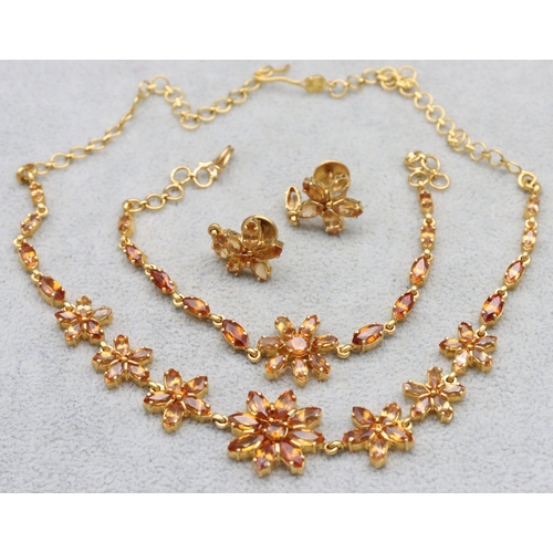 610 - A 22ct gold Indian suite, all mounted with yellow/orange coloured stones, comprising of drop necklac... 