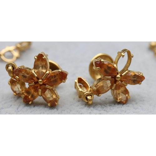 610 - A 22ct gold Indian suite, all mounted with yellow/orange coloured stones, comprising of drop necklac... 