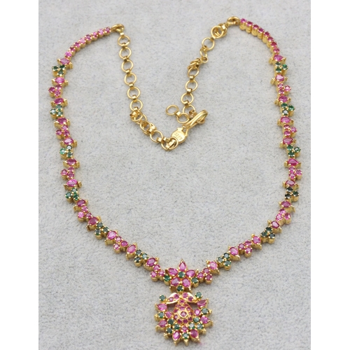 611 - A 22ct gold Indian drop necklace mounted with pink and green stones, 41cm long, 28.7 grams gross