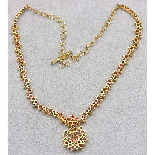 611 - A 22ct gold Indian drop necklace mounted with pink and green stones, 41cm long, 28.7 grams gross