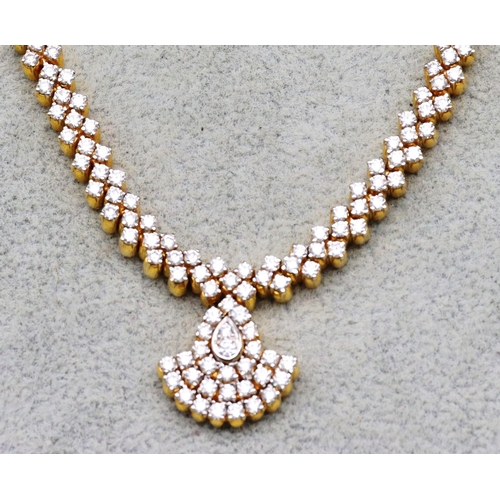 612 - A 22ct gold Indian diamond drop necklace, 38.5cm long, 25.5 grams gross