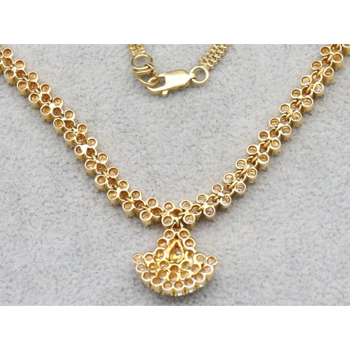 612 - A 22ct gold Indian diamond drop necklace, 38.5cm long, 25.5 grams gross