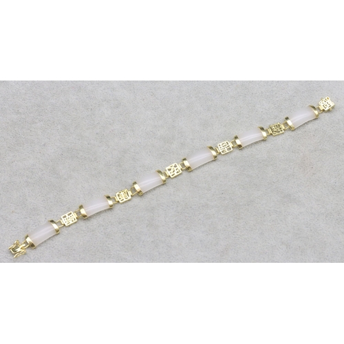 620 - An Oriental white hardstone and gilt Oriental style bracelet, 20cm long