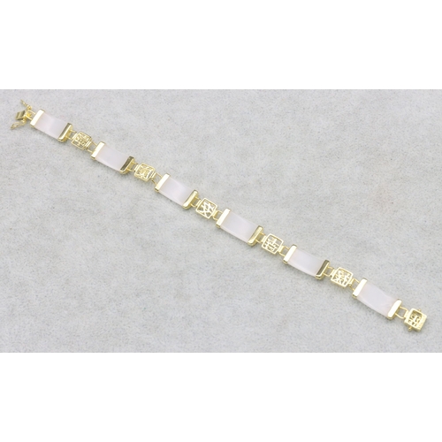 620 - An Oriental white hardstone and gilt Oriental style bracelet, 20cm long