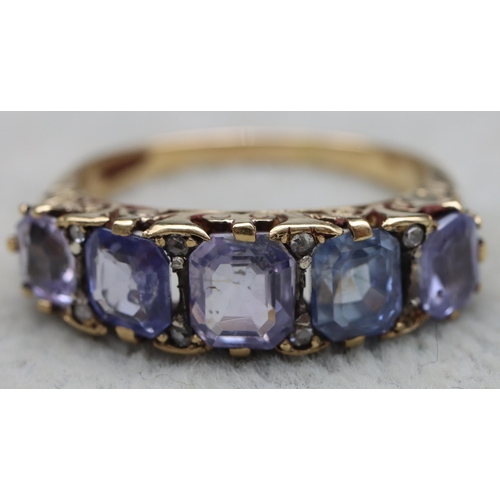 634 - An 18ct gold 5-stone sapphire ring (1 stone altered), Size V, 7.2 grams gross