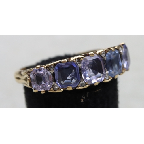 634 - An 18ct gold 5-stone sapphire ring (1 stone altered), Size V, 7.2 grams gross