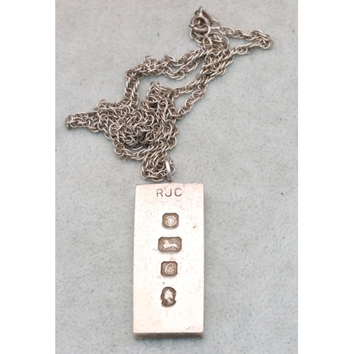 638 - A London silver nugget pendant with chain, 39.2 grams