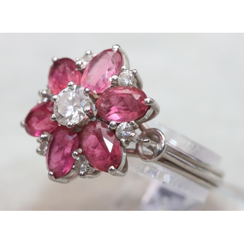 639 - A Swarovski ladies' cluster ring set with clear and pink stones, Size N/O (boxed with certificate)