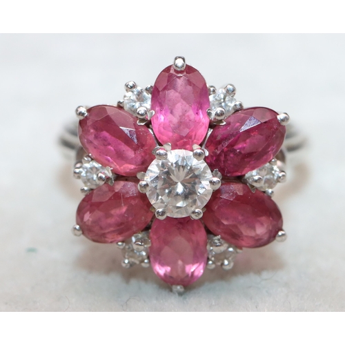 639 - A Swarovski ladies' cluster ring set with clear and pink stones, Size N/O (boxed with certificate)