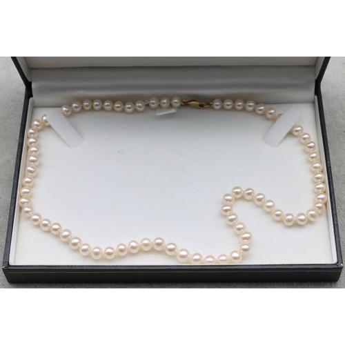 640 - A cultured pearl necklace with 9ct gold clasp, 45cm long (boxed)