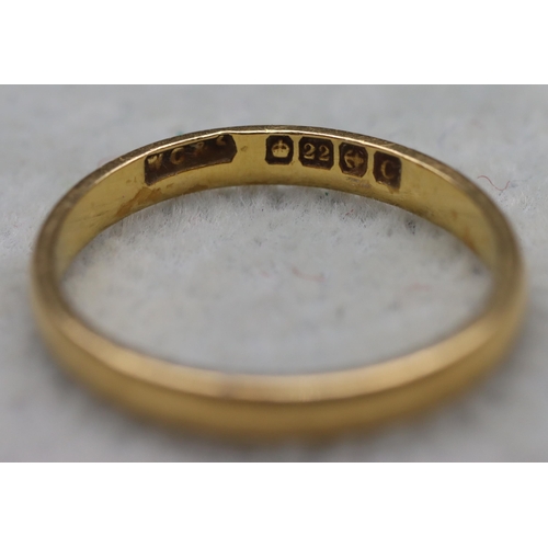 643 - A 22ct gold wedding ring, Size L, 2.1 grams