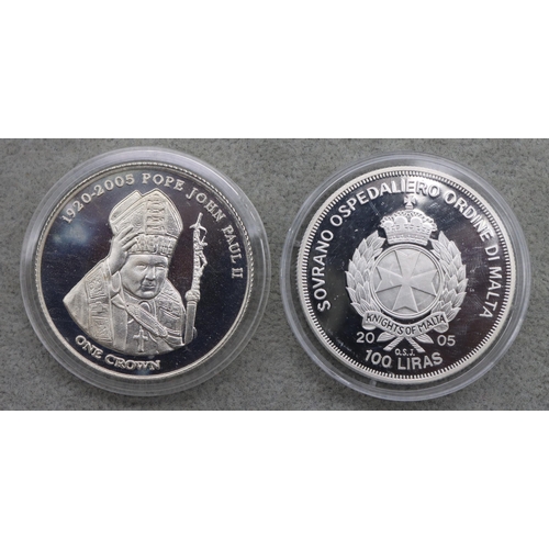 669 - A Malta Crown, 100 Liras coin and an Elizabeth II Crown