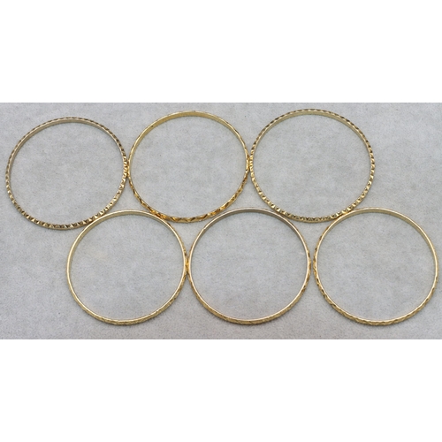 673 - 6 various gold plated bangles