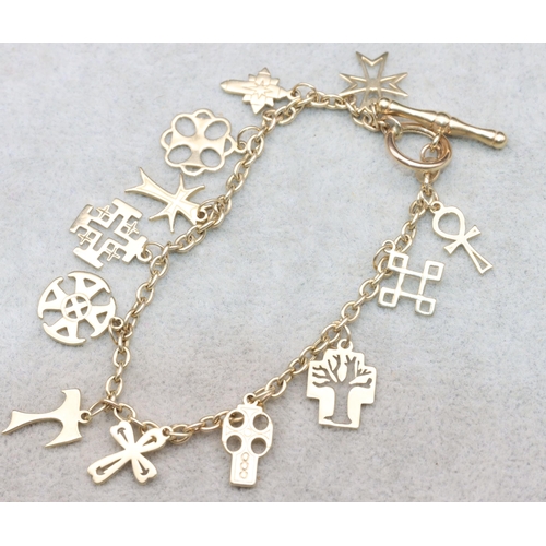 684 - A 9ct gold bracelet with T-bar lock, mounted with 12 charms, 9.1 grams