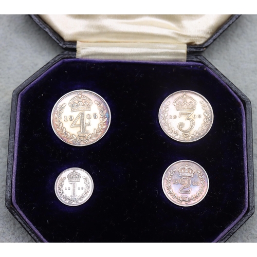 693 - An Edward VII four coin Maundy set, 1908, in original box