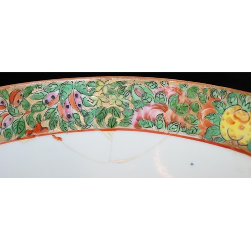 7 - A Cantonese round bowl on white ground with multi-coloured bird, butterfly, floral and leaf decorati... 