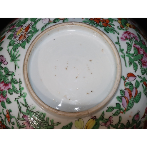 7 - A Cantonese round bowl on white ground with multi-coloured bird, butterfly, floral and leaf decorati... 