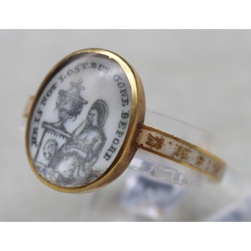 704 - An 18th Century gold and enamelled Mourning ring with oval top depicting a 3/4 length portrait of a ... 