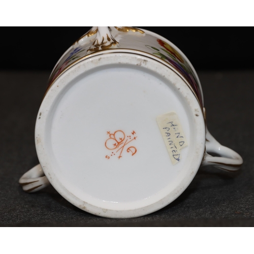 75 - A 19th Century Derby small 3-handled cup on white ground with hand painted floral, leaf and gilt dec... 