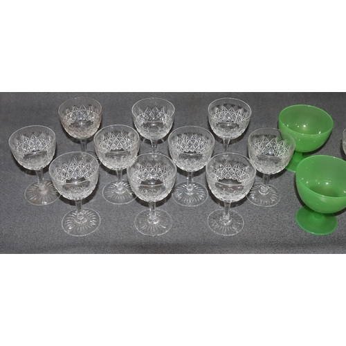 77 - A set of 10 Webb cut crystal glasses, 12cm high, a set of 7 engraved glasses and a pair of green gla... 