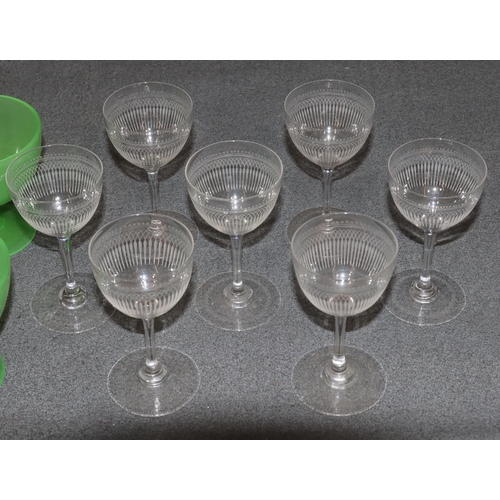 77 - A set of 10 Webb cut crystal glasses, 12cm high, a set of 7 engraved glasses and a pair of green gla... 