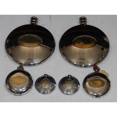 808 - A pair of large Grants of Dalvey circular hip flasks, 15.5cm high, 1 smaller similar circular hip fl... 