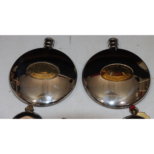 808 - A pair of large Grants of Dalvey circular hip flasks, 15.5cm high, 1 smaller similar circular hip fl... 