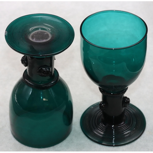 81 - A set of 10 18th/19th Century Bristol green glasses with raised stems on round sweeping bases, 12cm ... 