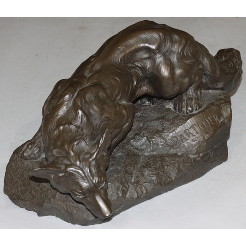 824 - A composition resin model of a fox after Bartelier, 39cm long, 18.5cm high