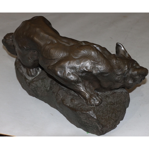 824 - A composition resin model of a fox after Bartelier, 39cm long, 18.5cm high