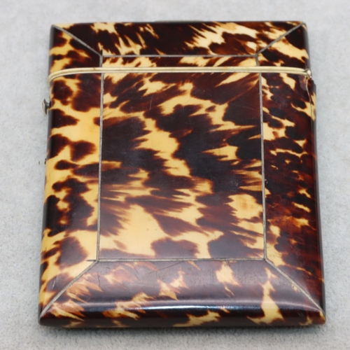 837 - A 19th Century tortoiseshell card case with hinged lid, 10.6cm high, 8cm wide