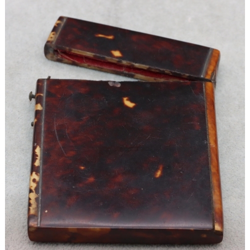 837 - A 19th Century tortoiseshell card case with hinged lid, 10.6cm high, 8cm wide