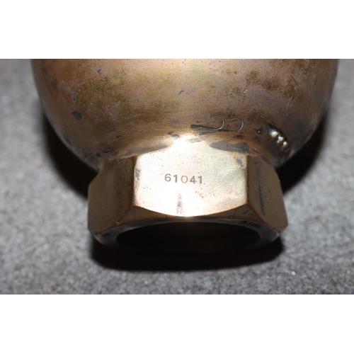 877 - A Loco Steam heavy brass whistle, 19cm high and 7 various heavy metal railways memorabilia etc. (8)