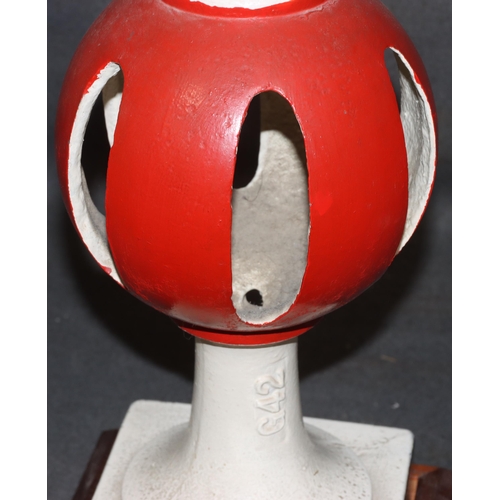 897 - A Railway cast iron red and white painted home signal finial on square base with later wooden base, ... 