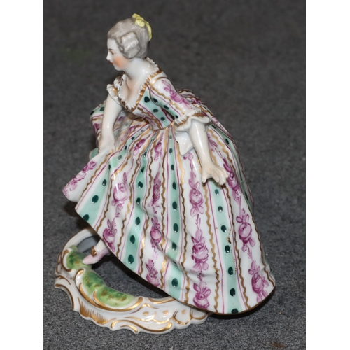 92 - A Vienna porcelain figure of a young lady in sweeping dress on white, green and turquoise ground, 12... 