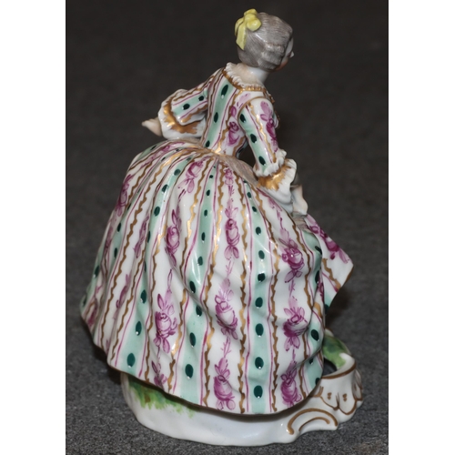 92 - A Vienna porcelain figure of a young lady in sweeping dress on white, green and turquoise ground, 12... 