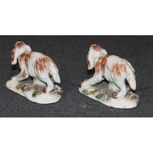 93 - A pair of 18th/19th Century Derby figures of dogs with encrusted floral decoration, 8cm wide, 5cm hi... 