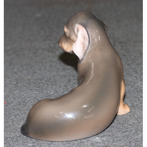 97 - A Royal Copenhagen figure of a Dachshund, 3140, 7.5cm high