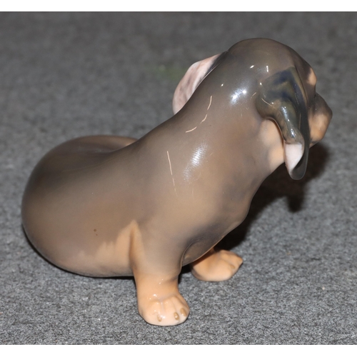 97 - A Royal Copenhagen figure of a Dachshund, 3140, 7.5cm high