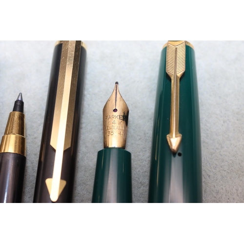 750 - A green Parker duofold fountain pen (boxed), a Parker pen, a similar Parker pen and another Parker p... 